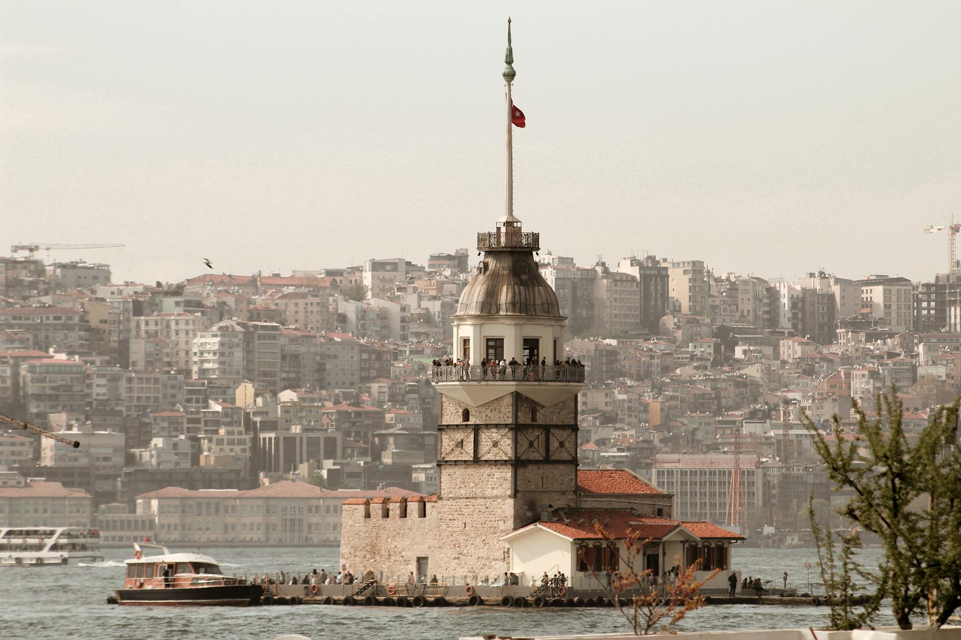 Visitors disembark from a transfer boat at the entrance of the Maiden's Tower.