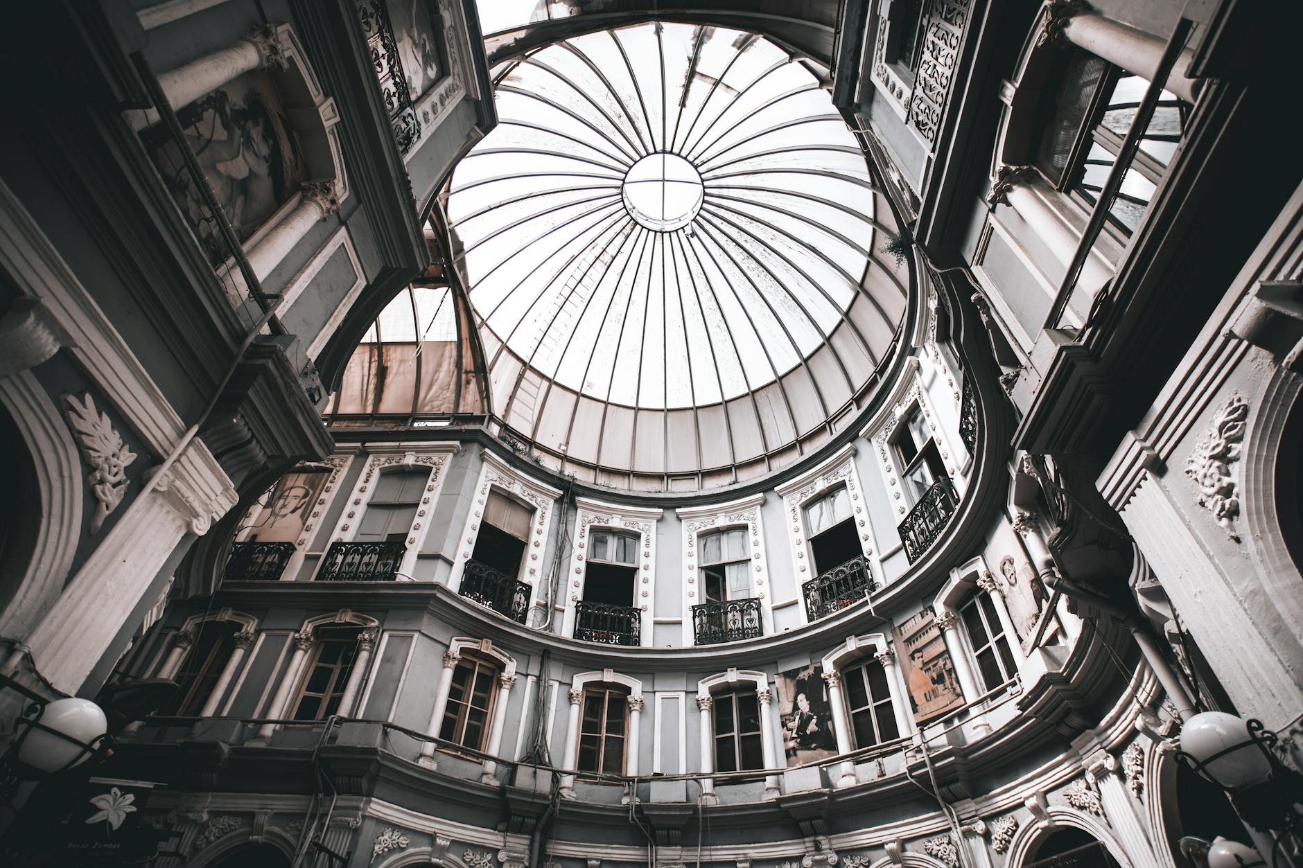 Ornate glass dome roof within a historical architecture passage in the Beyoğlu district.