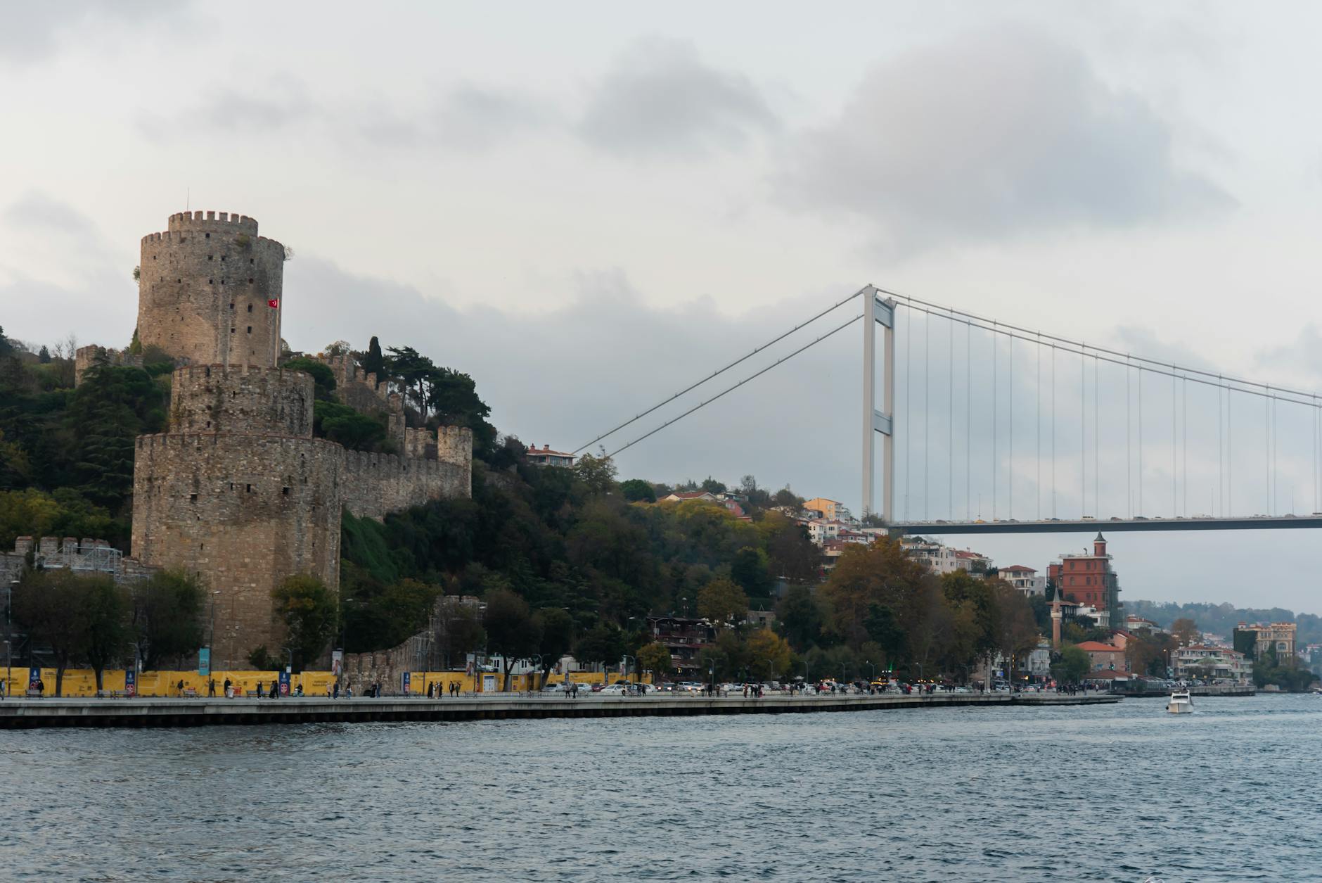 A scenic view of Rumeli Hisarı fortress and the Fatih Sultan Mehmet Bridge.